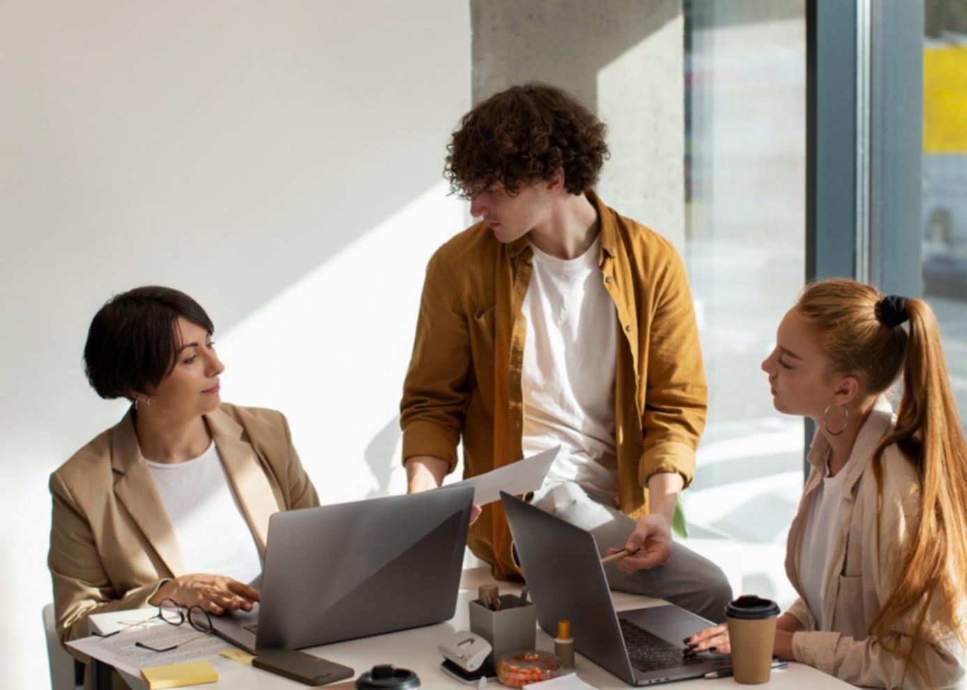 Seminar participants reviewing local search results on laptops